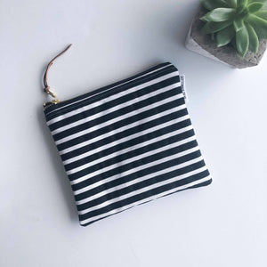 Simple zipped pouch in black and white stripes