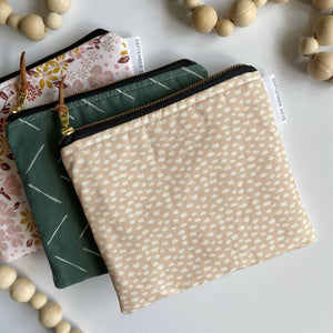 Simple zipped pouch in painted blush dot