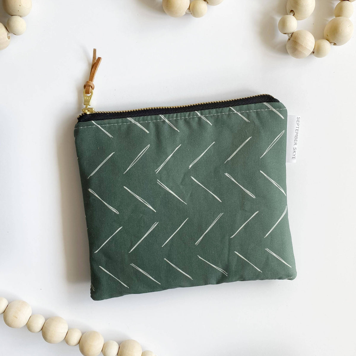 Simple zipped pouch in chevron duck green